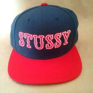 STUSSY blue and red adjustable snap-back cap.